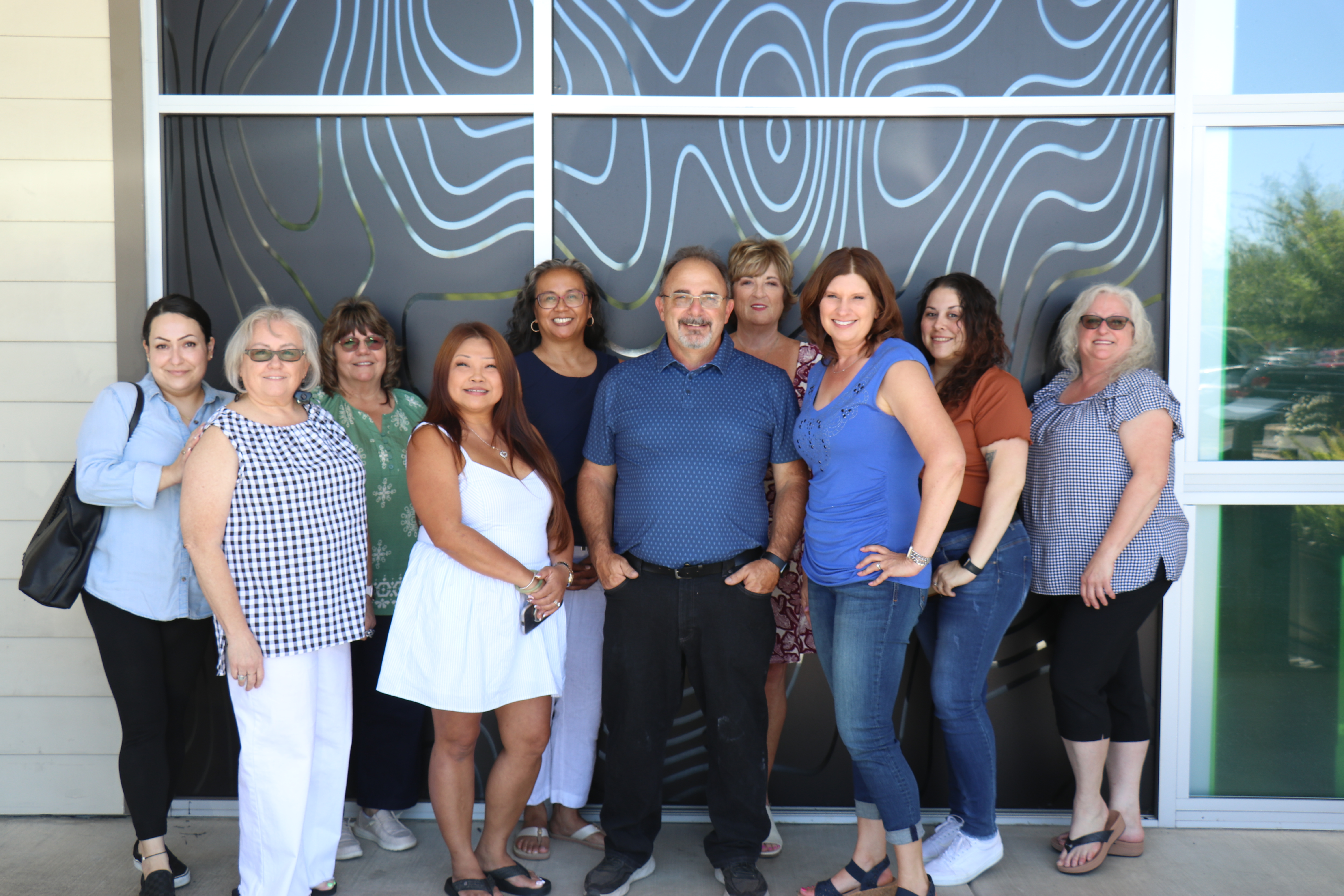 Group photo of staff at Beltone Hearing Aid Center in Fresno, CA
